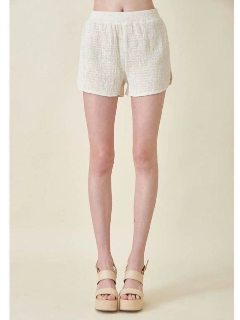 FORE unwind shorts in ivory crinkle pockets